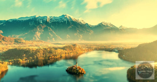 Lake Bled island church at golden hour with the Julian Alps in Slovenia