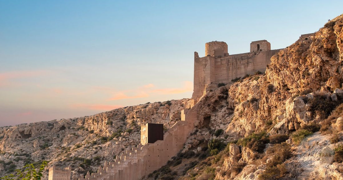 The Alcazaba fortress on the cliff at sunset in Almeria, Spain