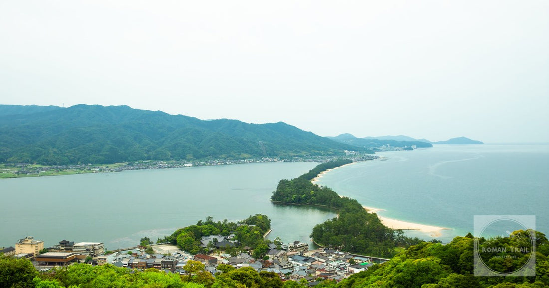 Amazing scenery of Amanohashidate sandbar covered with pine trees and connecting Miyazu Bay surrounded by green hills