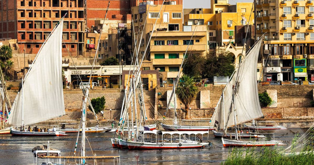 Traditional feluccas sailing on the Nile at Aswan, Egypt