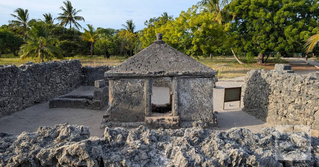 Ancient stone ruins among trees at Bagamoyo, Tanzania
