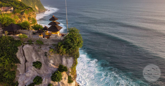 Uluwatu Temple on the cliffs above the Indian Ocean at sunset, Bali, Indonesia