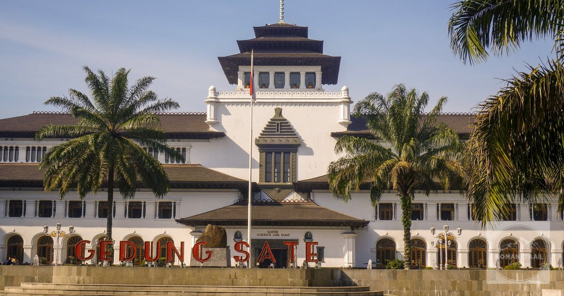 The Gedung Sate building framed by palms in Bandung, Indonesia