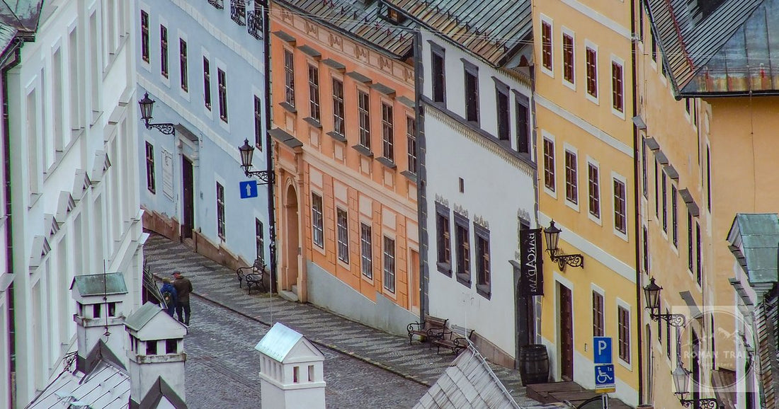 A historic street of coloured buildings in Banska Stiavnica, Slovakia.