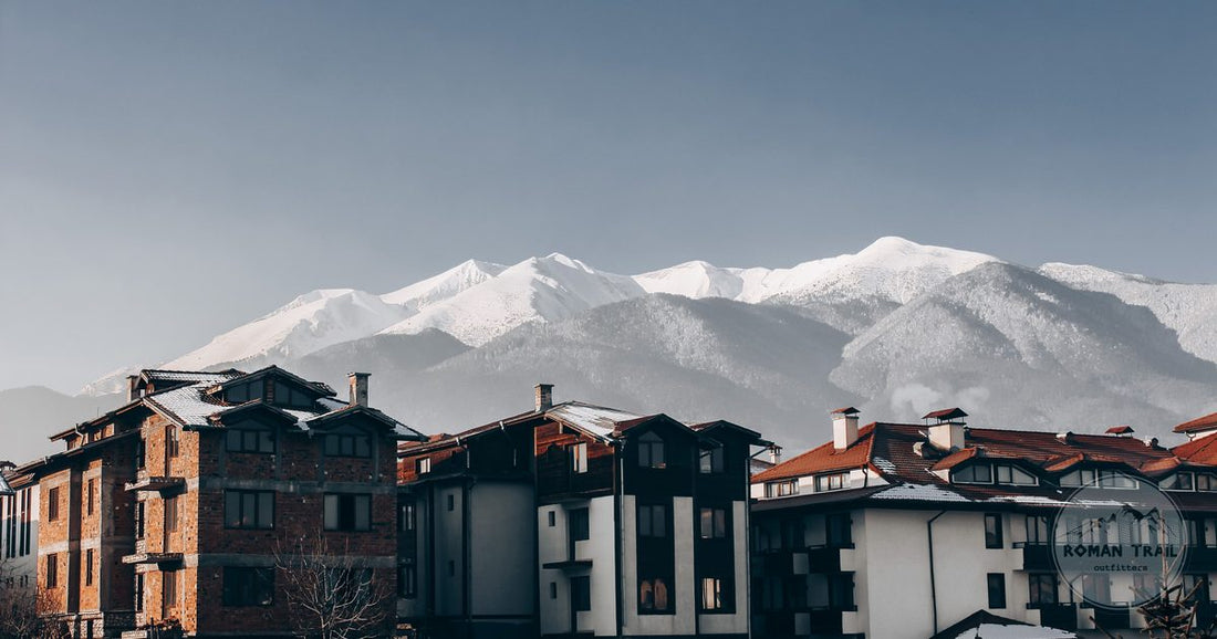 Snow covered buildings at Bansko below the mountains, Bulgaria