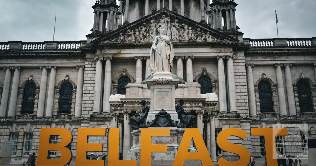 Belfast City Hall with the Belfast sign in front of it
