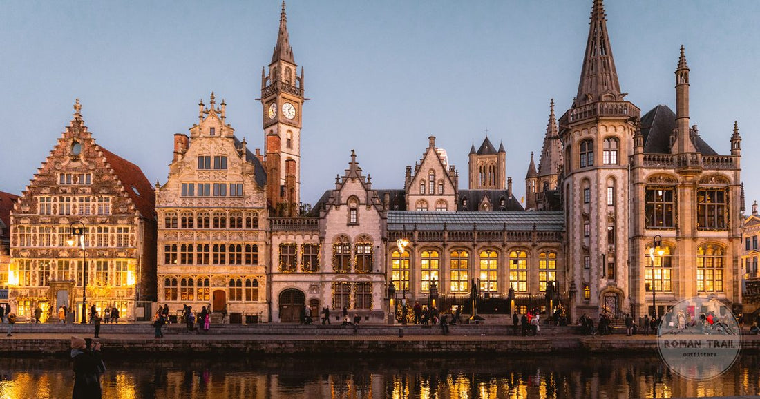 The Graslei guild houses in Ghent lit at dusk, Belgium packing list for women by Roman Trail Outfitters
