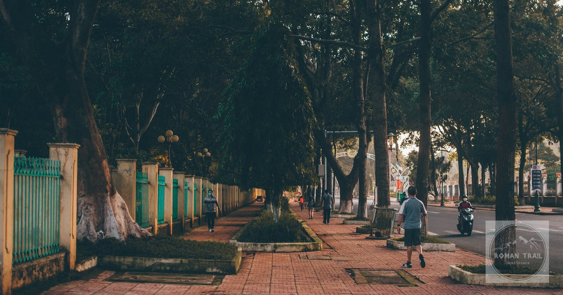 A street with scooters and pedestrians in Buon Ma Thuot, Vietnam