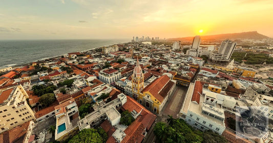Golden hour aerial view of the Cartagena walled city rooftops and cathedral in Colombia, featured image for a Cartagena packing list for women