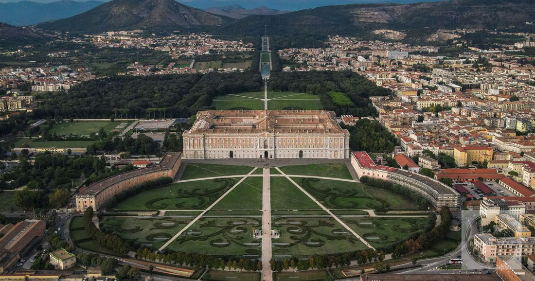 Stunning aerial photograph of the Royal Palace of Caserta and its expansive gardens.