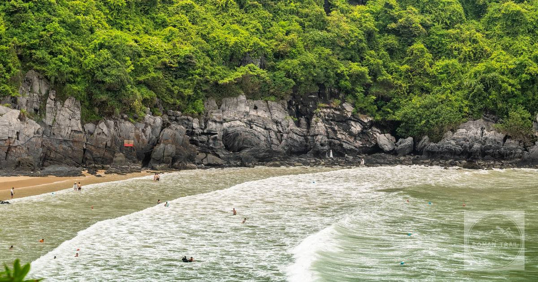 A beach below limestone cliffs on Cat Ba Island, Vietnam