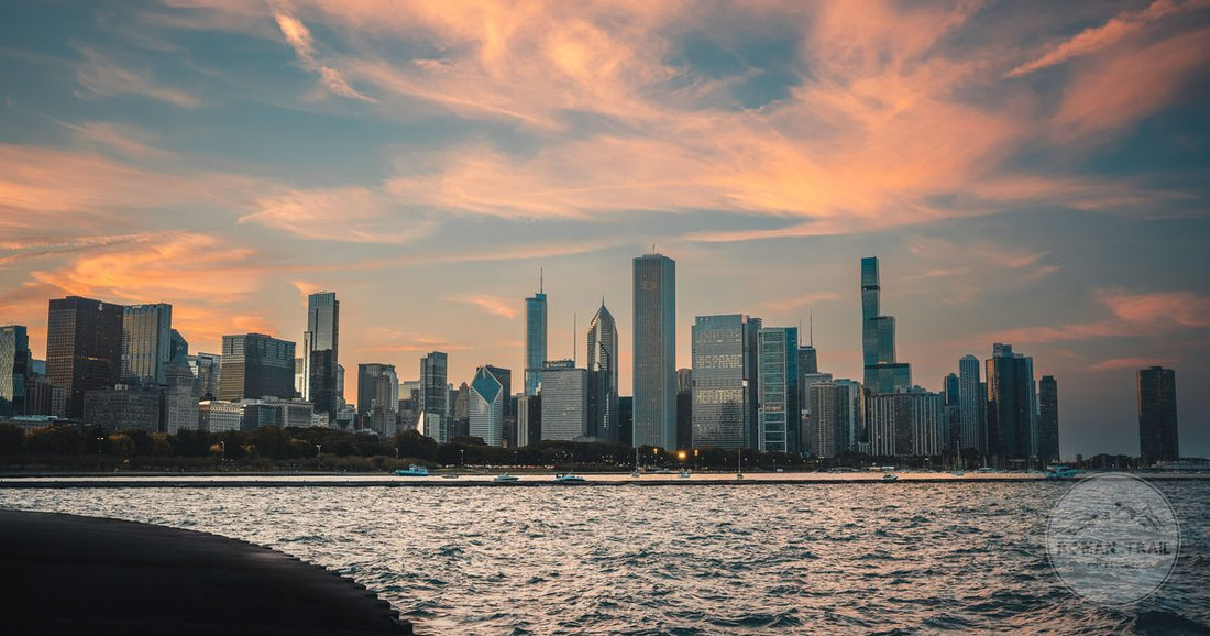 Chicago skyline at golden hour seen across Lake Michigan, Chicago packing list for women by Roman Trail Outfitters