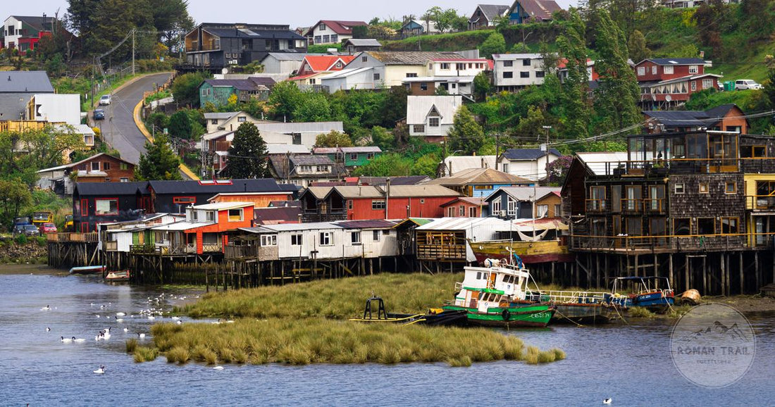Stilt houses and boats on the shoreline at Castro, Chiloé Island, Chile