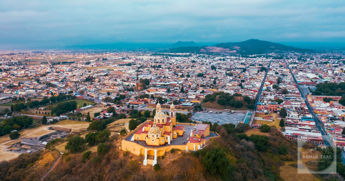 Drone view of Cholula, Puebla, featuring Iglesia de los Remedios atop the Great Pyramid.