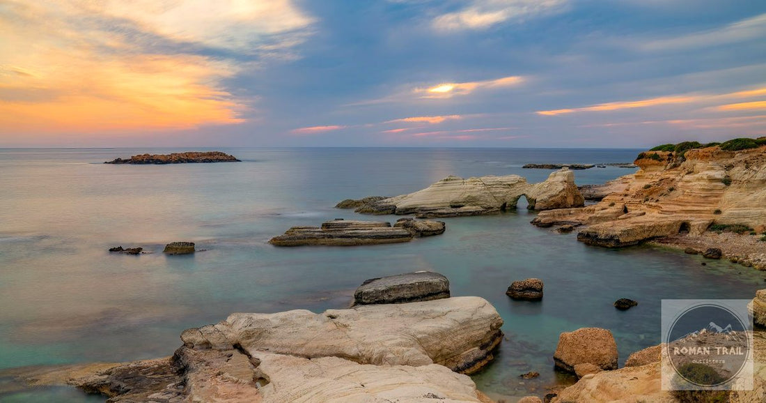Cyprus Mediterranean sea caves coastline at sunset