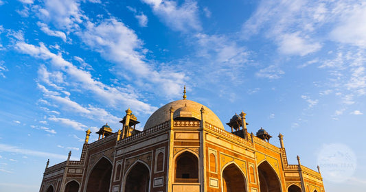 Humayun's Tomb in Delhi under a bright sky, Delhi packing list for women by Roman Trail Outfitters