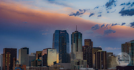 Denver skyline under a colourful sunset sky, Denver packing list for women by Roman Trail Outfitters
