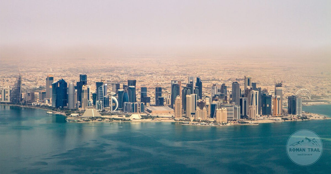 Aerial view of the Doha skyline under a clear sky, Qatar