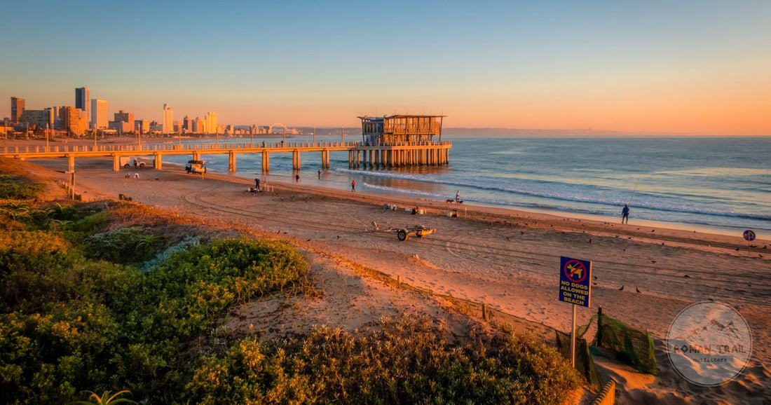 Sunrise over the Durban beachfront with the pier reaching into the Indian Ocean, South Africa