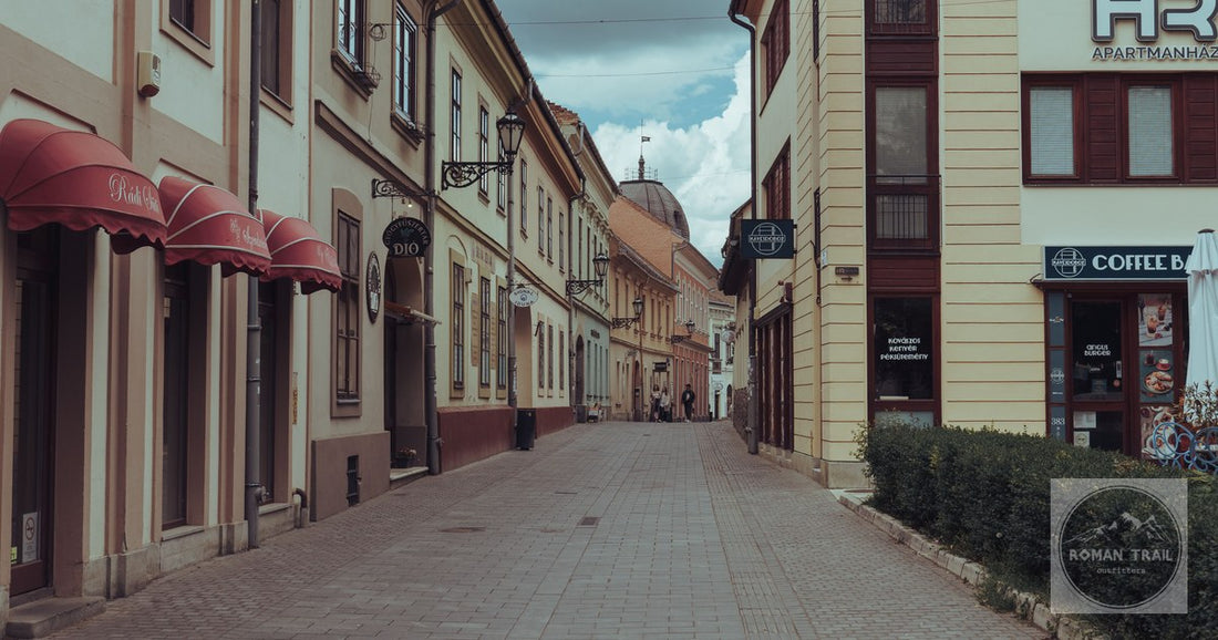 A cobbled alley of historic houses in Eger, Hungary