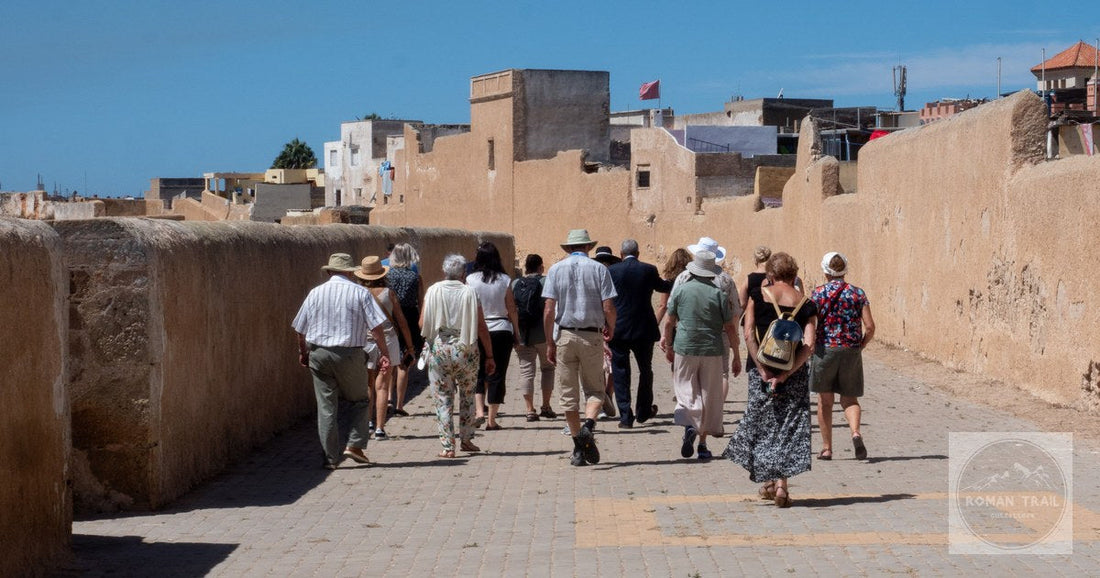 Visitors walking the ancient city walls at El Jadida, Morocco