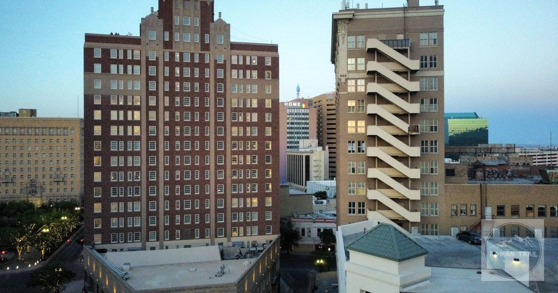 Aerial view of modern buildings in downtown El Paso at dusk.