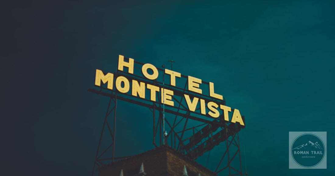 Illuminated Monte Vista hotel sign against a dark sky in Flagstaff, Arizona.