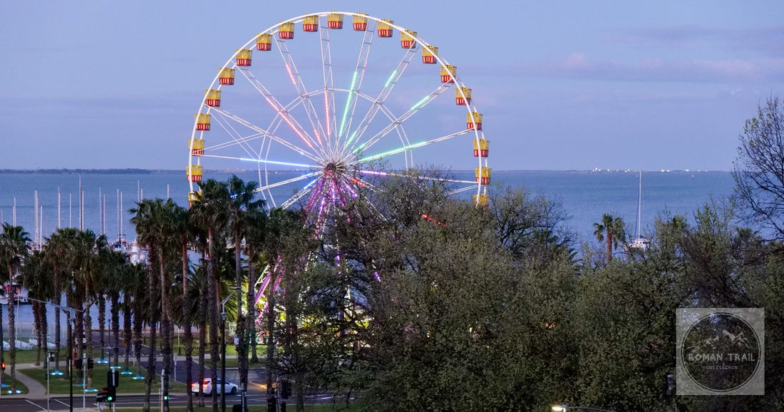 The ferris wheel on the Geelong waterfront at dusk, Corio Bay behind it.