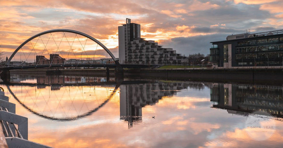 The Clyde Arc reflected in the River Clyde at sunset, Glasgow, Scotland
