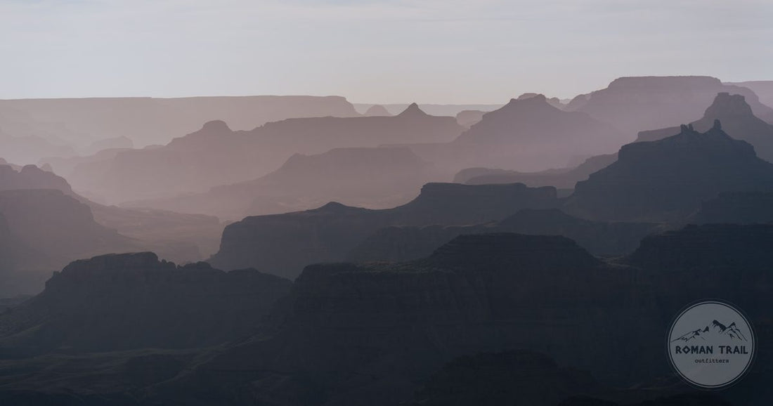 Layered cliffs of the Grand Canyon South Rim in hazy evening light