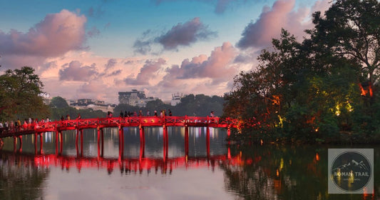 The Huc Bridge over Hoan Kiem Lake at dusk, Hanoi packing list for women by Roman Trail Outfitters