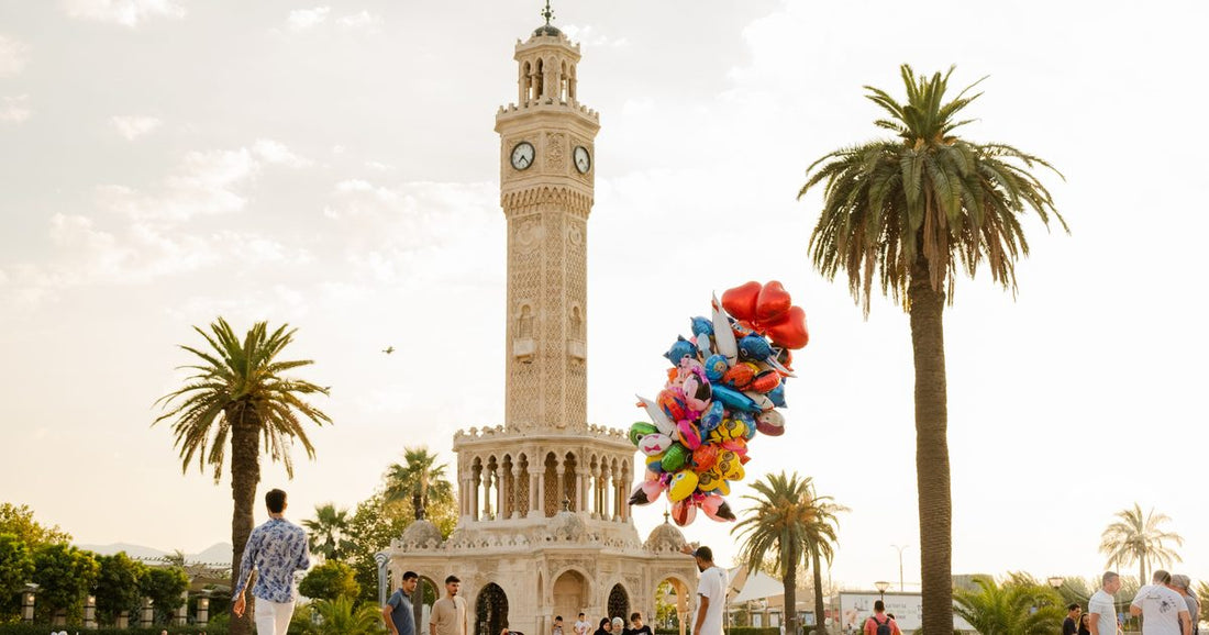People at the Izmir Clock Tower on a sunny day, Turkiye