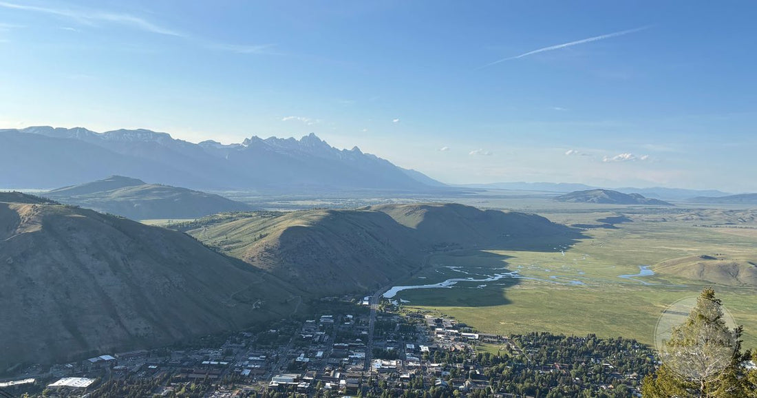An aerial view of Jackson Hole with the Teton Range behind it, Wyoming