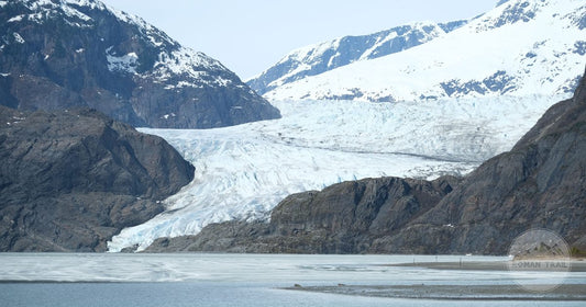 The Mendenhall Glacier reflected in still water at Juneau, Alaska