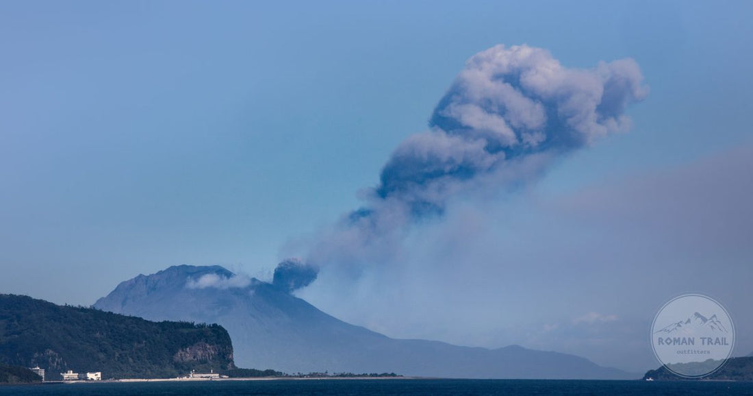 Sakurajima volcano erupting with a plume of smoke above Kagoshima, Japan
