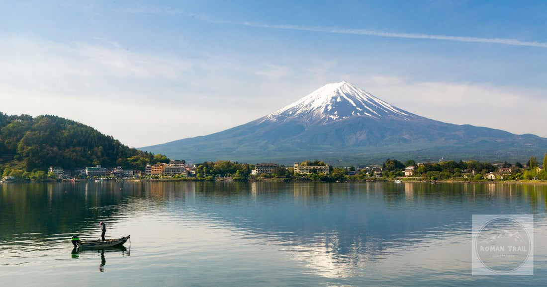 Mount Fuji above a fishing boat on Lake Kawaguchi, Japan