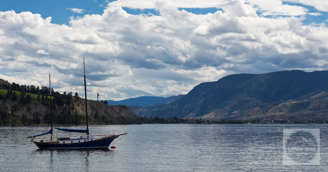 A boat on Okanagan Lake below the mountains at Kelowna, British Columbia