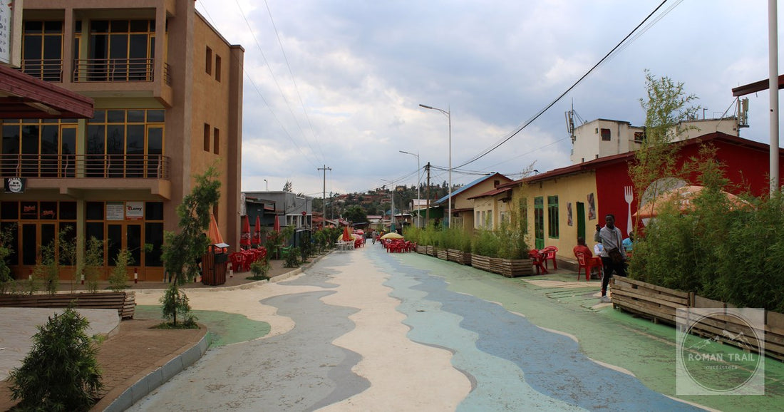 A street in the Nyamirambo district of Kigali with brightly painted buildings, Rwanda