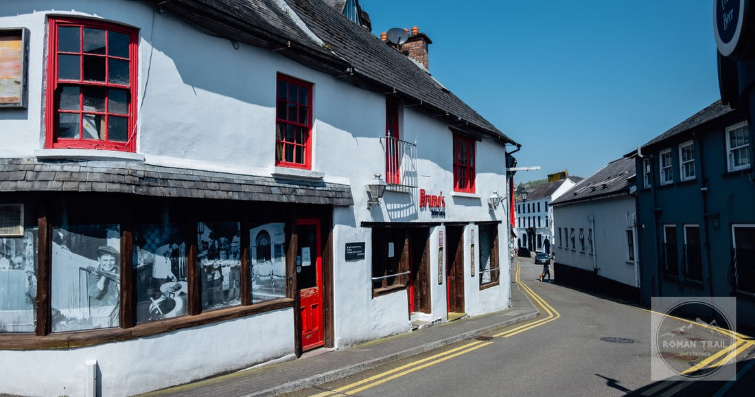 A quiet street and a historic white building in Kinsale, County Cork