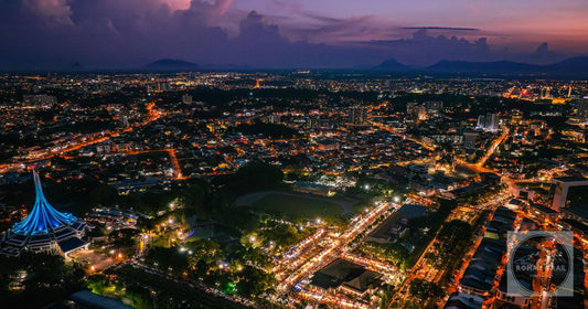 Kuching lit up at night from the air in Sarawak Malaysia