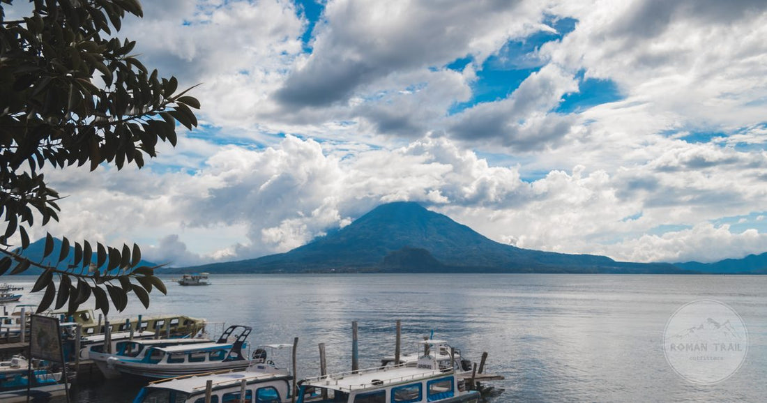 Boats docked below the volcano on Lake Atitlan, Guatemala