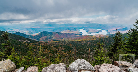 Breathtaking view of Adirondack Mountains and Lake Placid from Whiteface Mountain summit in fall.