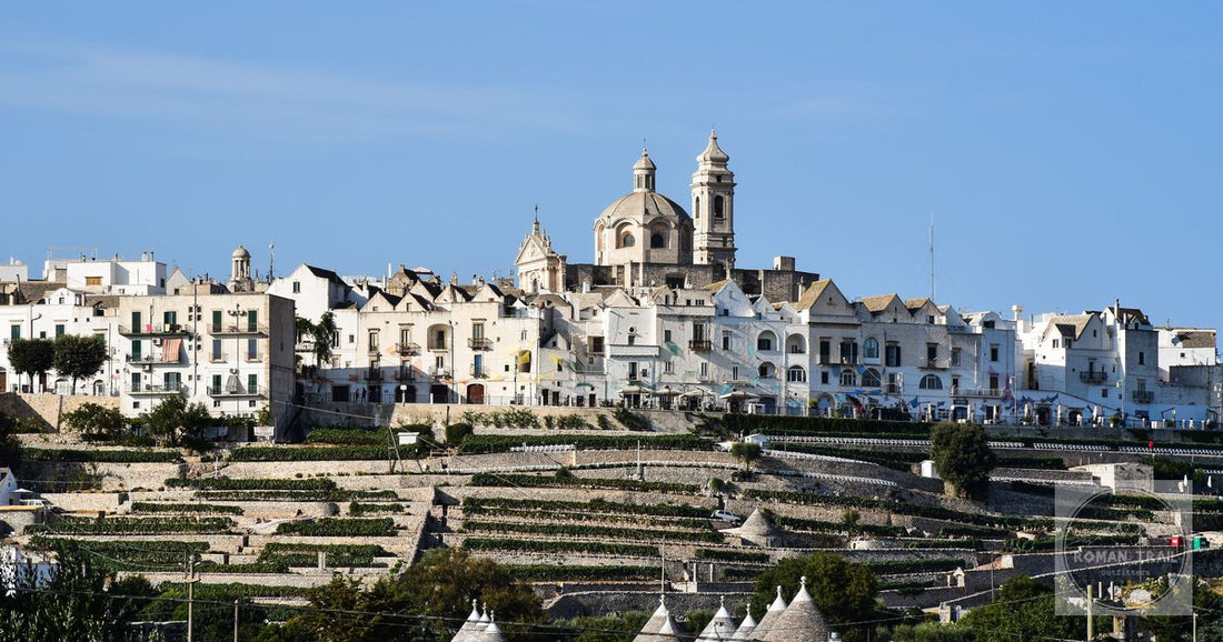 Charming whitewashed village of Locorotondo with iconic trulli in Apulia, Italy.