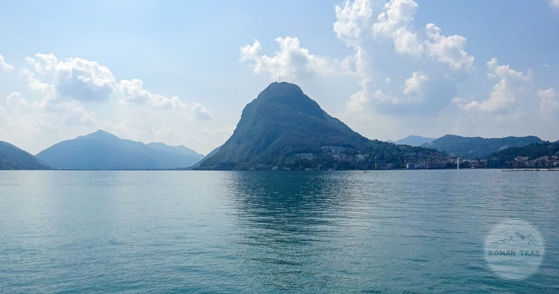 Lake Lugano and Monte Bre under a clear sky, Ticino, Switzerland