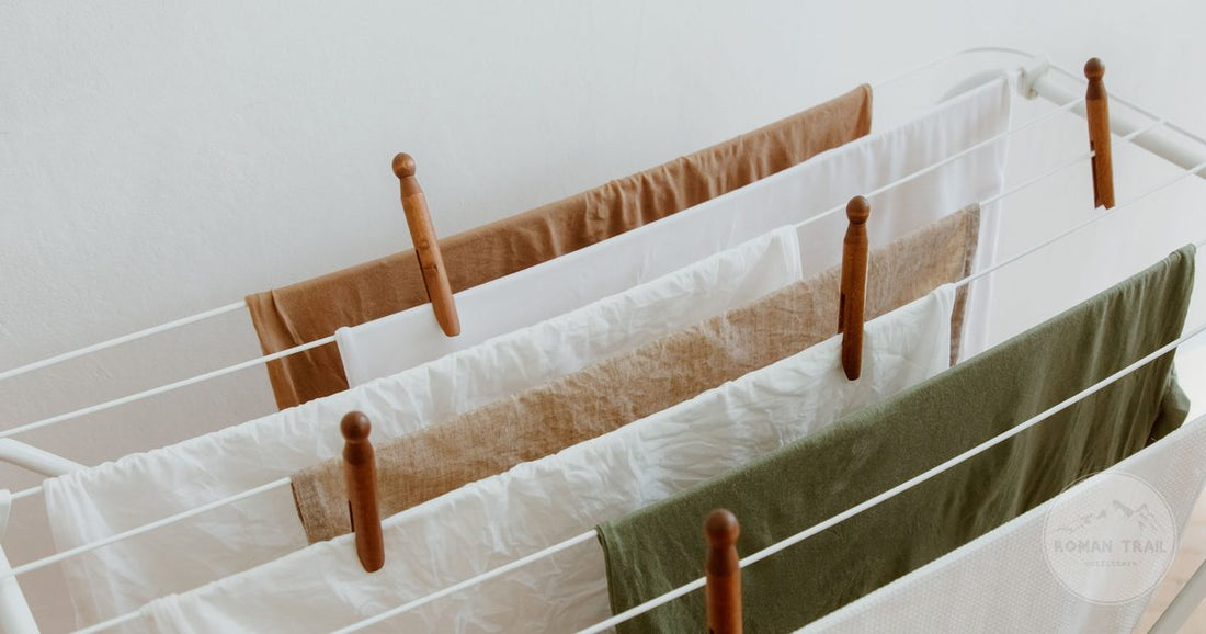 Knitwear laid out to dry flat on an indoor drying rack