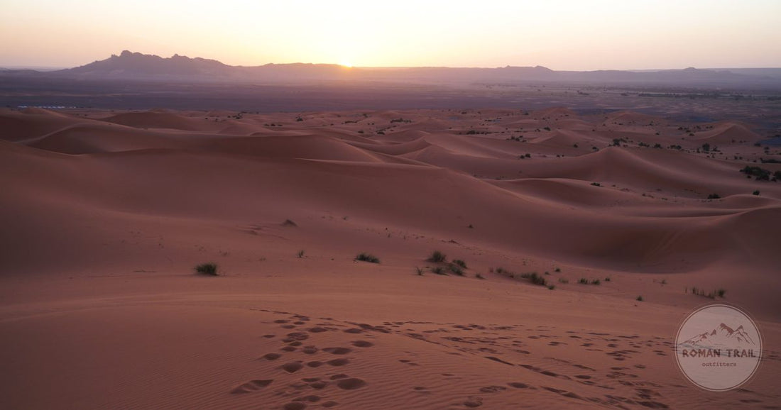 Sunrise over the Erg Chebbi dunes at Merzouga in Morocco, Merzouga packing list for women by Roman Trail Outfitters