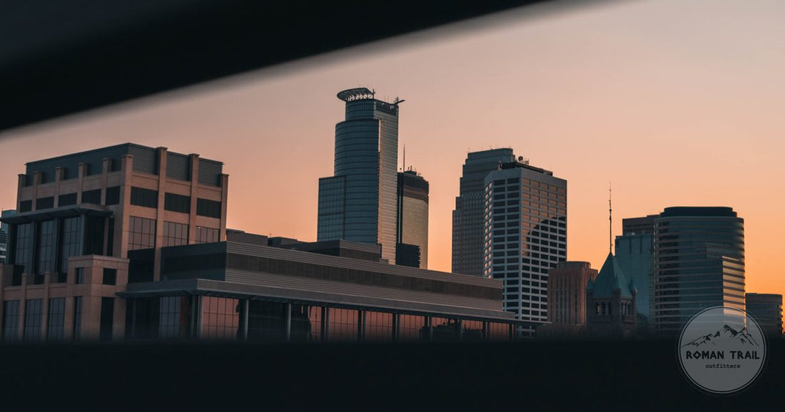 The Minneapolis skyline in evening light, Minneapolis packing list for women by Roman Trail Outfitters