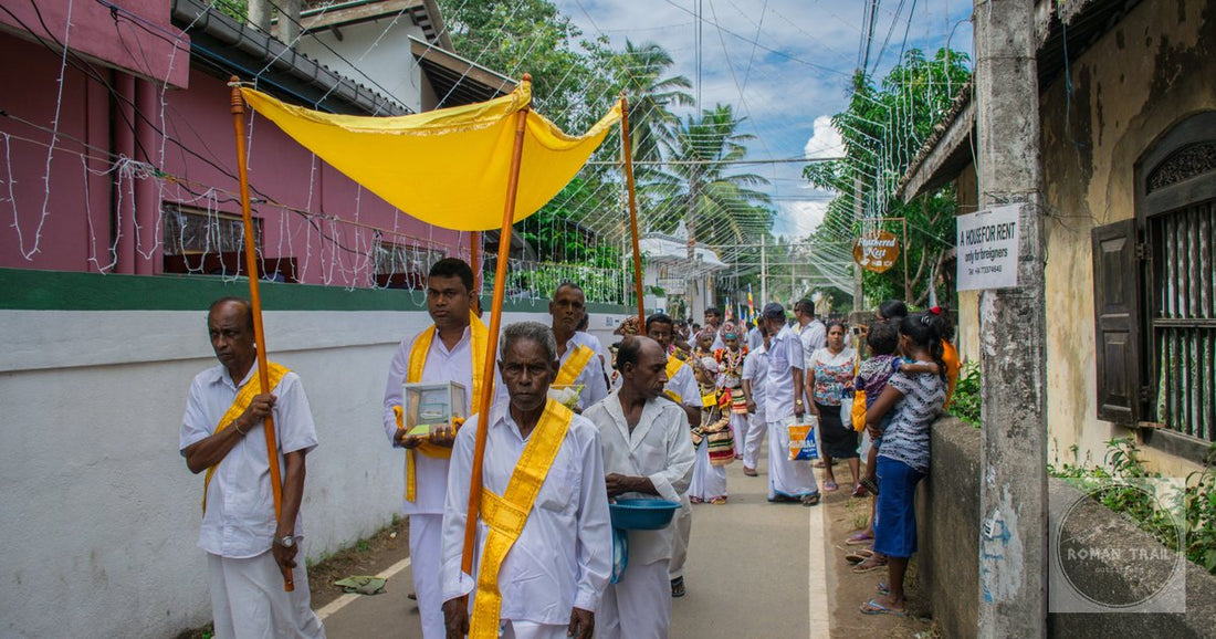 A Buddhist procession on a street in Mirissa, Sri Lanka