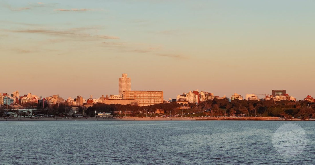 The Montevideo skyline from the Rio de la Plata at golden hour, Montevideo packing list for women by Roman Trail Outfitters