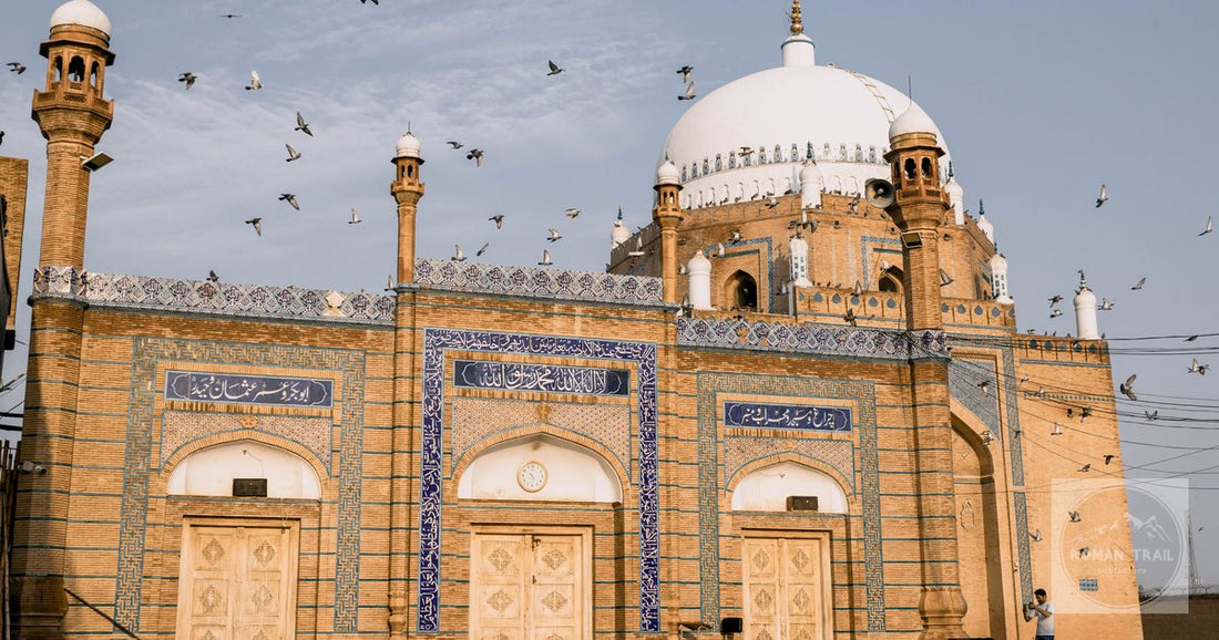Pigeons flying at the Bahauddin Zakariya shrine in Multan, Pakistan